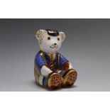 A ROYAL CROWN DERBY SCHOOLBOY TEDDY PAPERWEIGHT, H 8 cm