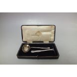 A CASED HALLMARKED SILVER 2 PC CHRISTENING SET - SHEFFIELD 1930, comprising a spoon and pusher