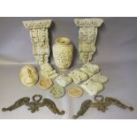 A COLLECTION OF ARCHITECTURAL PLASTER CASTS, to include various corbels and bosses, an urn and a