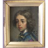 (XIX). A miniature head and shoulder portrait study of a young boy in elegant dress, unsigned, oil