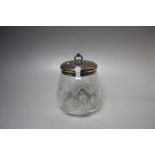 A HALLMARKED SILVER TOPPED PRESERVE JAR - BIRMINGHAM 1928