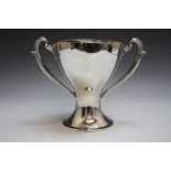 A HALLMARKED SILVER TWIN HANDLED CHALICE - SHEFFIELD 1912, makers mark for H.A., of trophy form, the