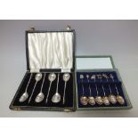 A CASED SET OF SIX HALLMARKED SILVER COFFEE SPOONS - LONDON 1960, having ornate mythical dragon