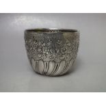 AN EARLY 20TH CENTURY HALLMARKED SILVER BOWL, indistinct London hallmarks to base, with embossed
