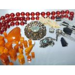 A COLLECTION OF VINTAGE COSTUME JEWELLERY, to include a hand knotted single strand of faux beads