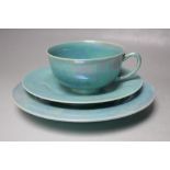 AN EARLY 20TH CENTURY RUSKIN TURQUOISE CRYSTALLINE GLAZED TRIO, comprising tea cup, saucer and