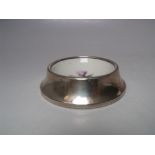 A DECORATIVE HALLMARKED SILVER PIN DISH, of circular form, having image of a thistle to the