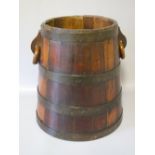 A 19TH CENTURY IRON BANDED AND COOPERED DUTCH WOODEN BUCKET, with alternate dark and light staves,