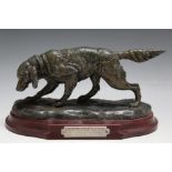 A MODEL OF A SETTER, in a bronzed finish, W 20 cm