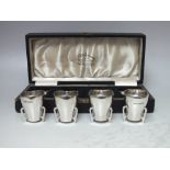 A CASED SET OF FOUR HALLMARKED SILVER ROCKET SALTS - BIRMINGHAM 1915