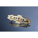 A GOOD EXAMPLE OF A HALLMARKED 9CT GOLD SEED PEARL AND GEM SET BAR BROOCH, makers mark M & C, W 4.