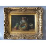 G.F.K. (XIX). Continental school still life study of birds nests, pottery jugs and apple, signed