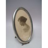 A 20TH CENTURY SILVER OVAL PICTURE IN THE ART NOUVEAU STYLE, H 17.5 cm