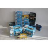 A COLLECTION OF 20 BOXED VANGUARDS DIECAST VEHICLES to include two Rover 3500 V8 Police Escort