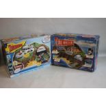 A BOXED MATCHBOX THUNDERBIRDS TRACY ISLAND together with a boxed Vivid Imaginations Interactive