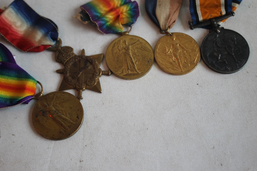 A WWI 1914-1915 STAR MEDAL TRIO, named to 1537 SJT C. W. Bragger Worc. Yeo.., along with a victory