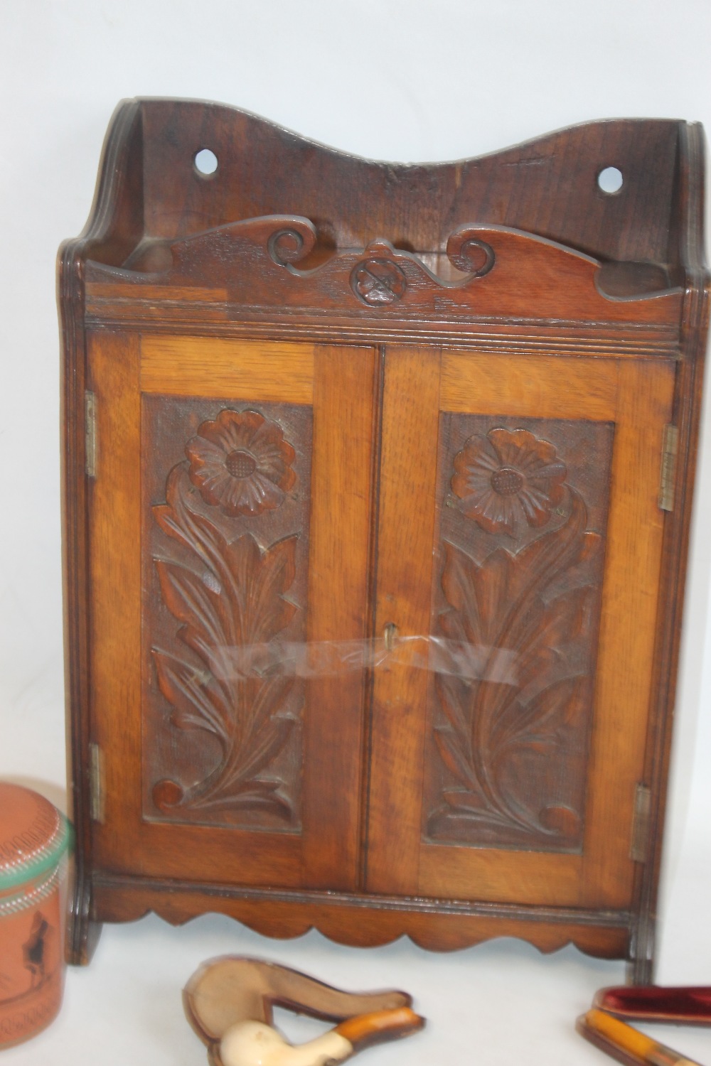 AN EDWARDIAN TWO DOOR SMOKERS' CABINET with terracotta tobacco jar, along with another jar and two - Image 2 of 5