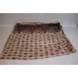 A LARGE ANTIQUE ANGLO INDIAN SILK SHAWL decorated with a border of buildings and trees with all over