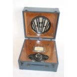 A CASED 1930'S BEETHOVEN MINOR PORTABLE VALVE RADIO, with blue finish