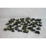 A COLLECTION OF PLAYWORN MILITARY DIECAST VEHICLES BY DINKY, BRITAINS, MATCHBOX ETC, to include