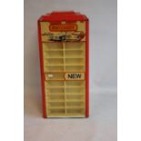 A PLASTIC MATCHBOX REVOLVING COUNTER-TOP DISPLAY CABINET, H 59 cm x W 29 cm