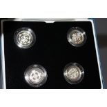 A ROYAL MINT SILVER PROOF £1 FOUR COIN SET, dated 1999, 2000, 2001 and 2002, with COA/Booklet, in