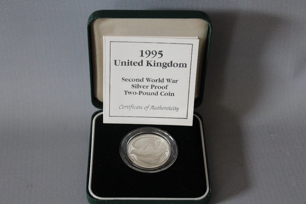 A ROYAL MINT 1995 'SECOND WORLD WAR' SILVER PROOF £2 COIN, with COA/Booklet, in original - Image 2 of 2