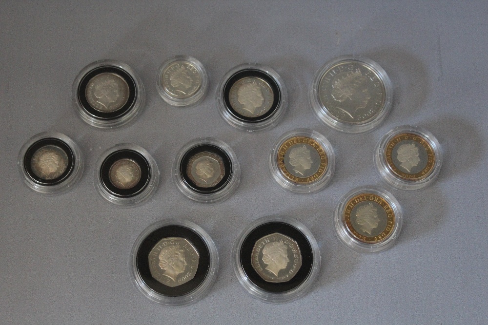 A ROYAL MINT 2009 SILVER PROOF COIN COLLECTION TWELVE COIN SET, comprising £5, £2 (3), £1, 50p (2)