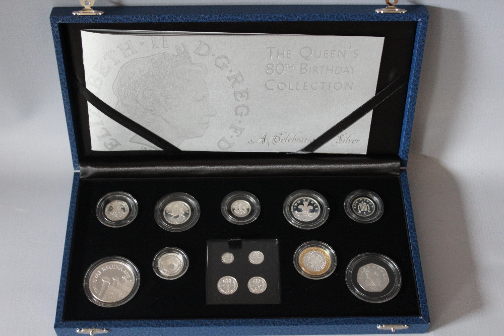 A ROYAL MINT 'THE QUEENS 80TH BIRTHDAY' SILVER PROOF NINE COIN SET AND FOUR MAUNDY COINS, comprising