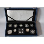 A ROYAL MINT 'THE QUEENS 80TH BIRTHDAY' SILVER PROOF NINE COIN SET AND FOUR MAUNDY COINS, comprising