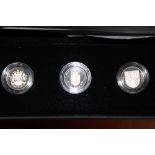 A ROYAL MINT 2013 '30TH ANNIVERSARY ROYAL ARMS COLLECTION' £1 THREE COIN SET, with COA/Booklet, in
