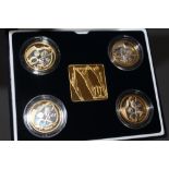 A ROYAL MINT 2002 'COMMONWEALTH GAMES' SILVER PROOF FOUR COIN SET TOGETHER WITH A GOLD PLATED