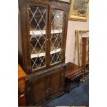 A GLAZED CORNER CABINET AND A NEST OF TABLES (2)