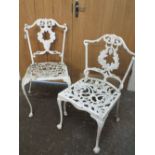 TWO PAINTED WHITE CAST GARDEN CHAIRS