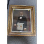 A FRAMED AND GLAZED OIL OVER PRINT OF A MASONIC GENTLEMAN