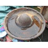 A MEXICAN HAT SHAPED PIG TROUGH