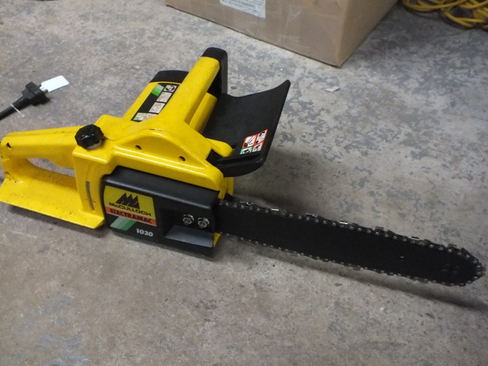 AN ELECTRIC CHAINSAW