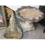 A CLAM SHELL EFFECT BIRD BATH TOGETHER WITH A GNOME PLANTER