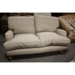 A MODERN UPHOLSTERED STONE COLOURED SETTEE W-158 CM