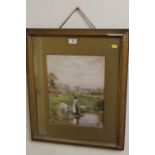 A FRAMED AND GLAZED WATERCOLOUR OF A GIRL WATERING CALFS SIGNED LOWER RIGHT S GARRETT