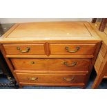 AN ORIENTAL STYLE HARDWOOD FOUR DRAWER CHEST - FADED H-78 CM W-92 CM