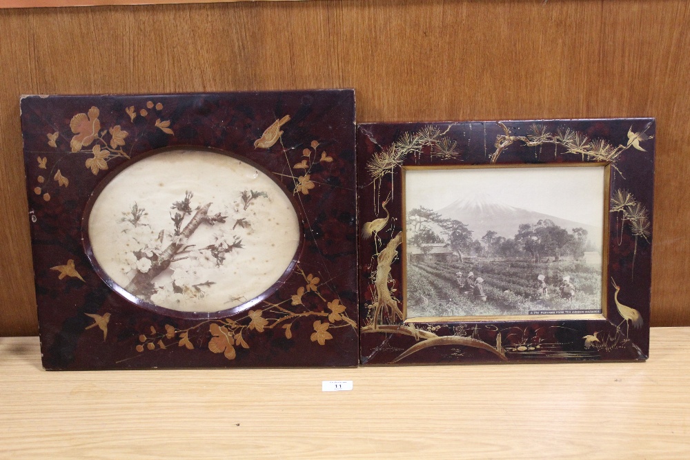 A PAIR OF EARLY 20TH CENTURY LACQUERED JAPANESE PHOTO FRAMES