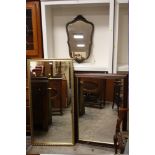 A LARGE MODERN GILT FRAME MIRROR 123 X 62 CM TOGETHER WITH TWO FURTHER MIRRORS (3)