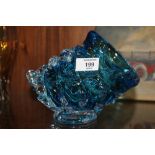 A MODERNIST STYLE BLUE ART GLASS BASE IN THE FORM OF A SHELL