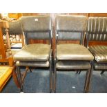 A SET OF FOUR MODERN LEATHERETTE METAL CHAIRS