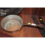 A LARGE VINTAGE COPPER PAN