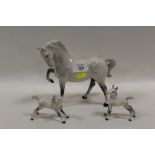 A BESWICK GREY HORSE TOGETHER WITH TWO FOALS (3)