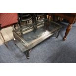 A MODERN METAL COFFEE TABLE AND GLASS TOPCondition Report:H- 40 cm W- 53 cm L- 107 cm
