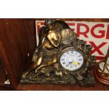 A DECORATIVE INLAID MANTLE CLOCK