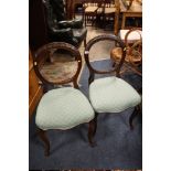 A PAIR OF ANTIQUE MAHOGANY DINING CHAIRS